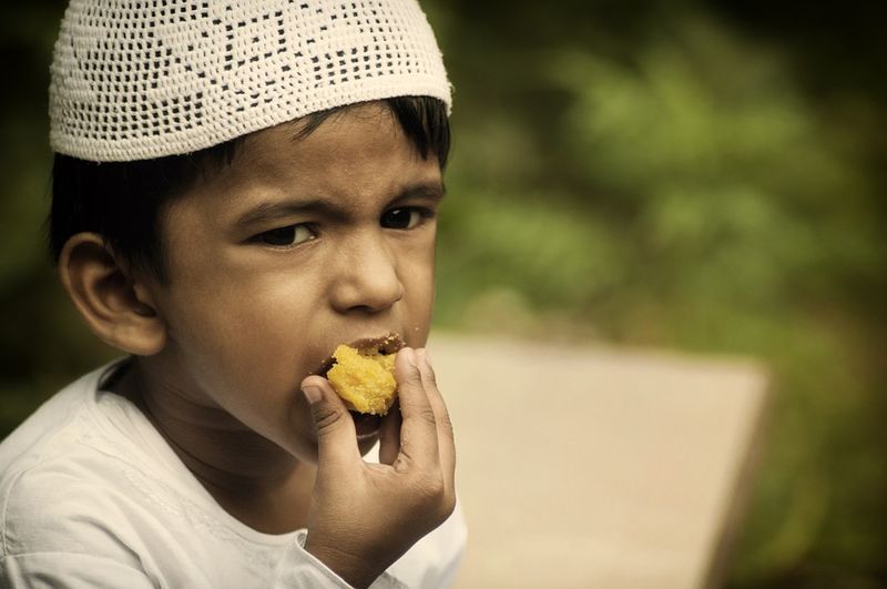 File:Muslim boy eating during Ramadan.jpg